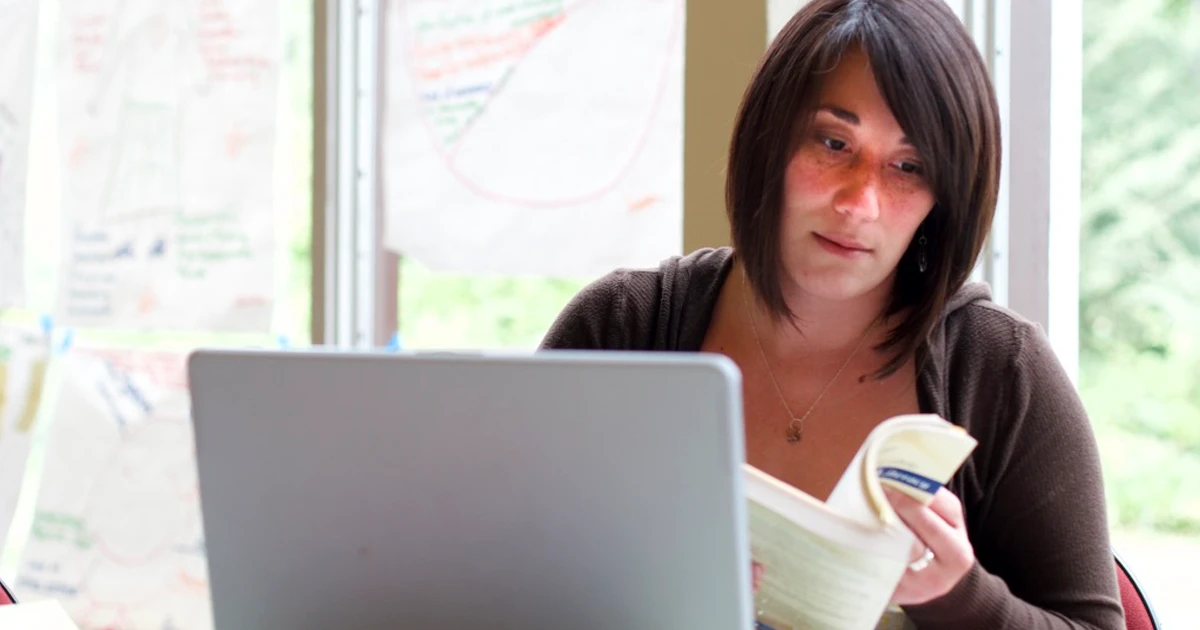 Educator reviewing learning materials