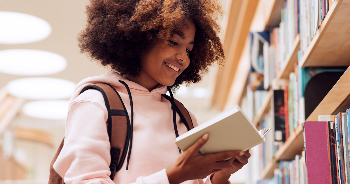 Middle school student in the school library