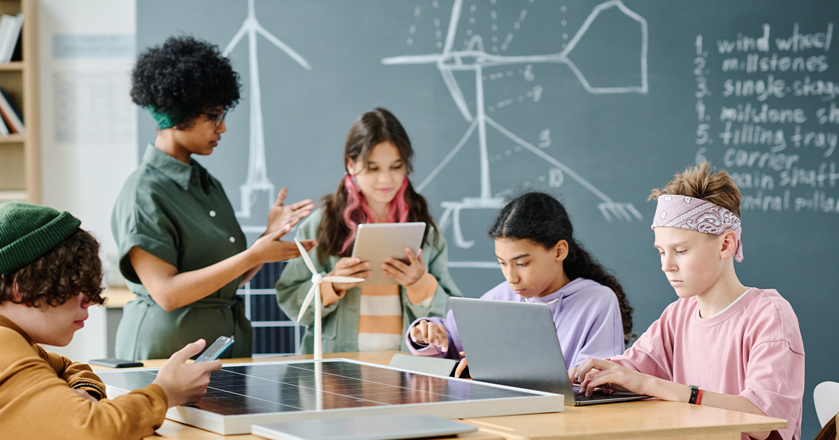 Teacher and students in science class