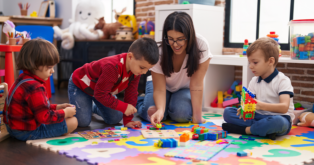 Teacher with young children doing math